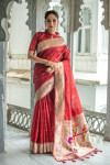 Red color paithani silk saree with zari woven border