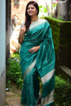 Green color raw silk saree with woven design