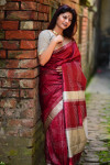 Maroon color raw silk saree with woven design