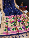 Navy blue color paithani silk saree with zari woven work