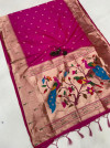 Rani pink color paithani silk saree with weaving work