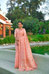 Peach color tussar silk saree with zari woven border