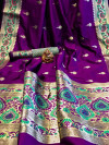 Purple color soft banarasi silk saree with zari woven border