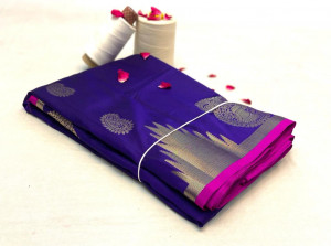 Purple color banarasi silk saree with zari woven work