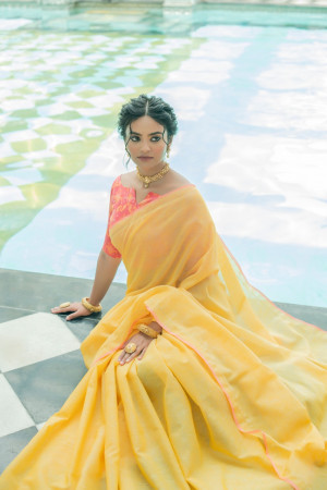 Yellow color soft linen saree with weaving work