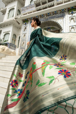 Dark green color paithani silk saree with zari woven border