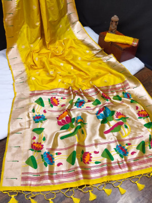 Yellow color paithani silk saree with  zari woven work