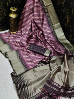 Magenta color tussar silk saree with zari woven work