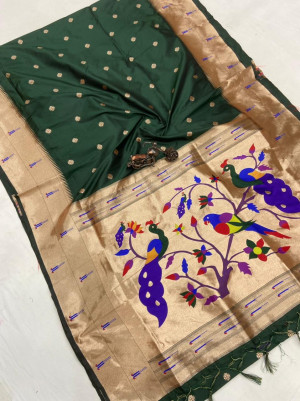 Dark green color paithani silk saree with weaving work