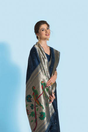 Navy blue color paithani silk saree with zari woven border