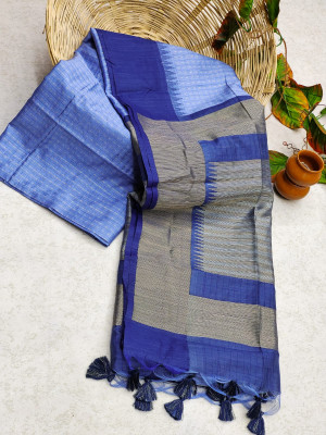 Blue color tussar silk saree with zari woven contrast border