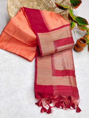 Peach color tussar silk saree with zari woven contrast border