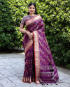 Magenta color patola silk saree with woven design