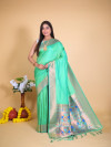 Pista green color paithani silk saree with zari weaving work