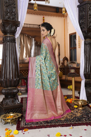 Sea green color banarasi silk saree with zari weaving work