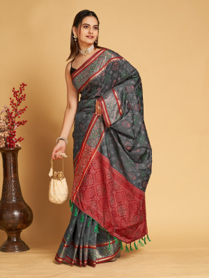 Gray color patola silk saree with weaving work