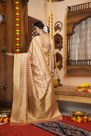 Peach color soft organza silk saree with zari weaving work