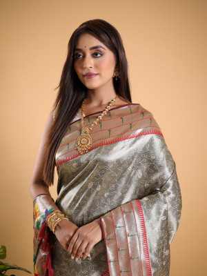 Gray color tissue silk saree with woven design