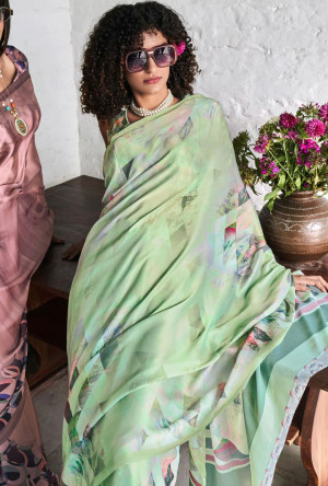 Pista green color soft muslin crepe silk saree with digital printed work