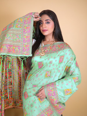 Sea green color banarasi silk saree with woven design