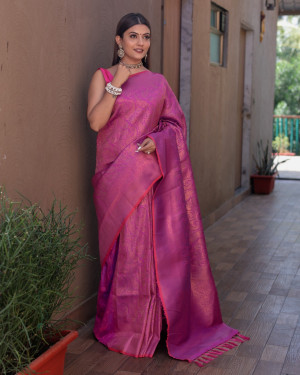 Rani pink color kanchipuram silk saree with zari woven work