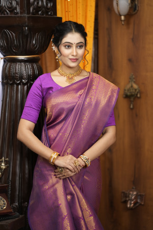 Magenta color kanjivaram silk saree with zari weaving work