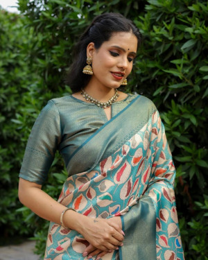 Rama green color soft silk saree with zari weaving work