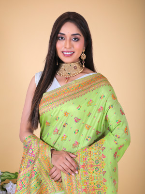 Mahendi green color banarasi silk saree with woven design