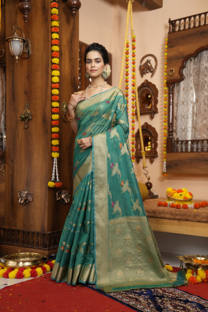 Green color soft organza silk saree with zari weaving work