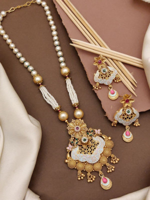 Meenakari And Pearl Studded Eyes Attractive Golden Necklace Set