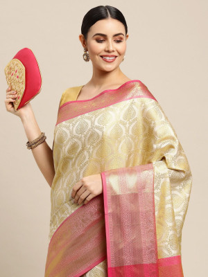 Off white color kanchipuram silk saree with zari woven work