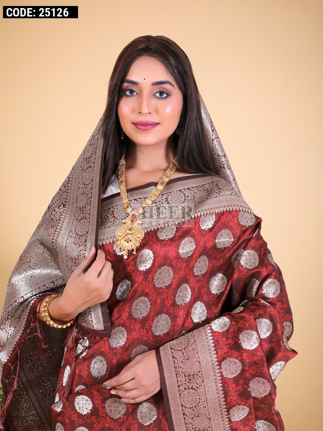Maroon color banarasi silk saree with zari weaving work