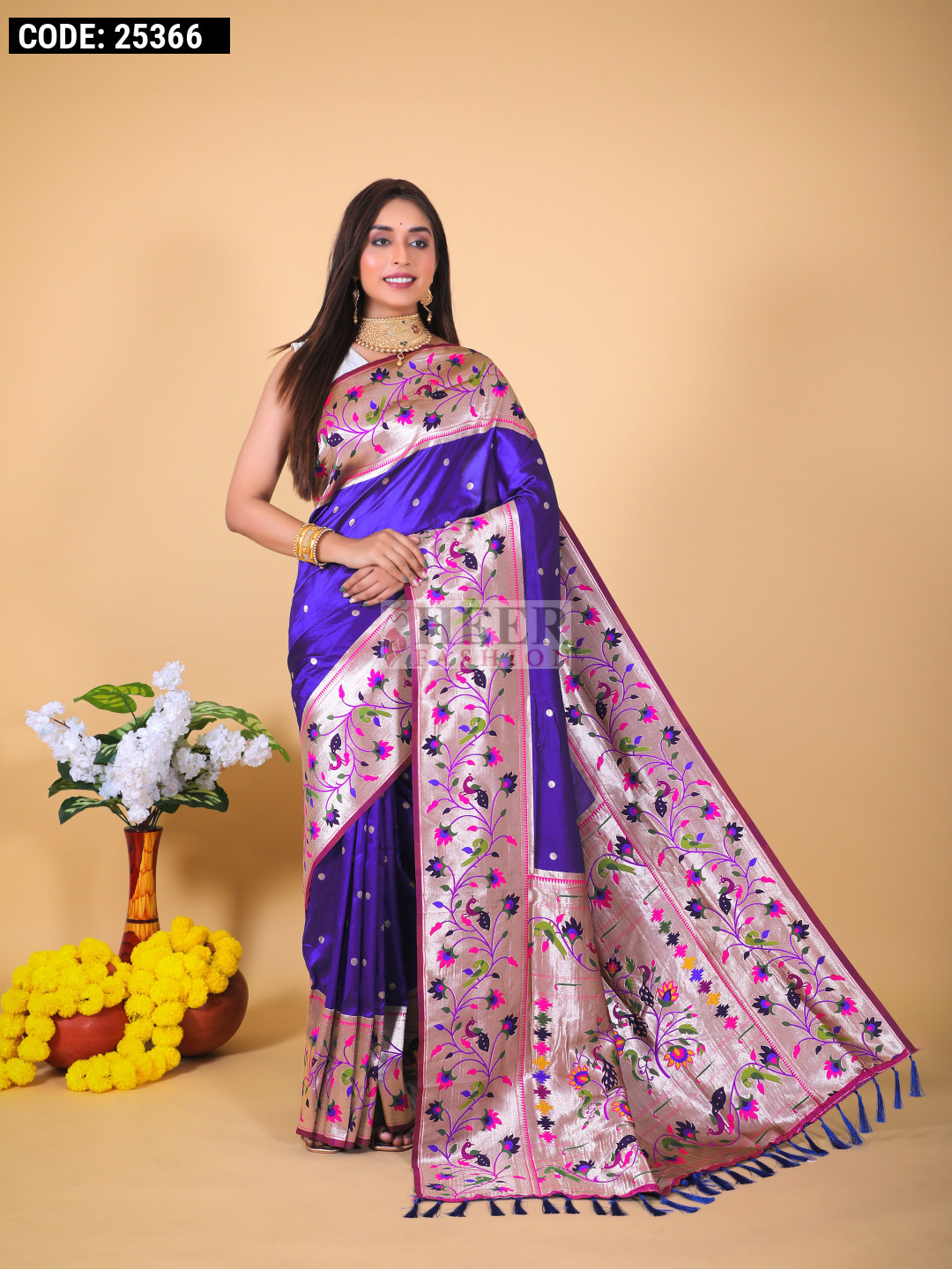 Royal blue color paithani silk saree with zari weaving work