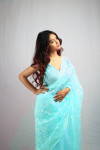 Sea green color soft organza silk saree with embroidery work