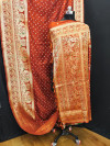 Orange color bandhej silk saree with meenakari weaving work