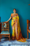 Yellow color soft paithani patola silk saree with zari weaving work
