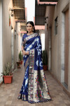 Navy blue color soft dola silk saree with sibori print & zari weaving work