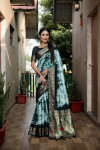 Green color dola silk saree with sibori printed work