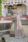 Green color soft tussar silk saree with patola printed work