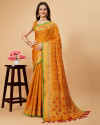 Mustard yellow color patola silk saree with woven design