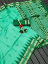 Sea green color soft tussar silk saree with weaving temple border