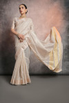 Off white color mulberry silk saree with zari weaving work