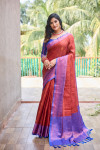 Maroon color kanjivaram silk saree with woven design