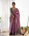 Lavender color kanjivaram silk saree with zari weaving work