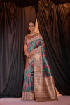 Rama green color tussar silk saree with zari weaving work
