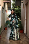 Green color soft dola silk saree with sibori print & zari weaving work