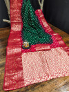 Green and red color bandhej silk saree with meenakari weaving work