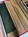 Green color kanjivaram silk saree with zari weaving work