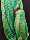 Green color soft kanjivaram patola silk saree with zari weaving work