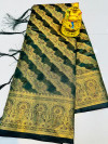Dark green color organza silk saree with zari weaving work